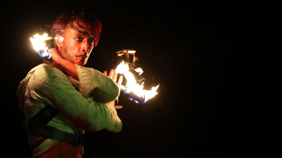 A member of the Beltane Fire Society takes part in the Samhuinn Fire Festival in Edinburgh