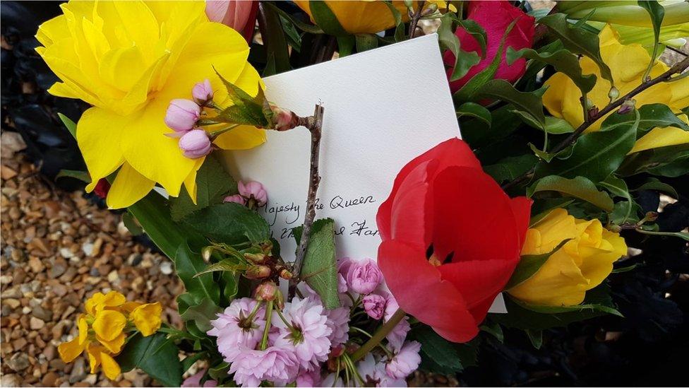 Flowers at the Norwich Gates at Sandringham Estate following the duke's death