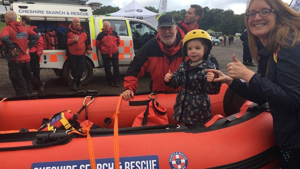 girl in search and rescue boat