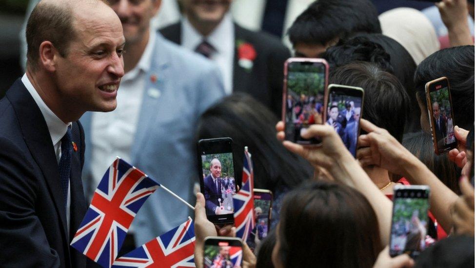 William meets crowds in Singapore