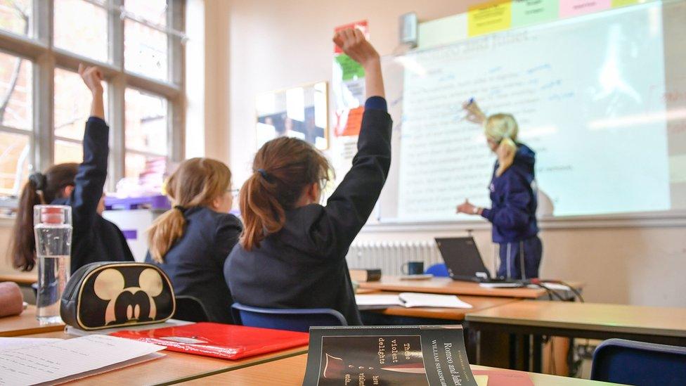 Teacher and students in a classroom