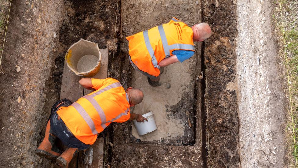 Men in trench, Warham Camp excavation, 2023