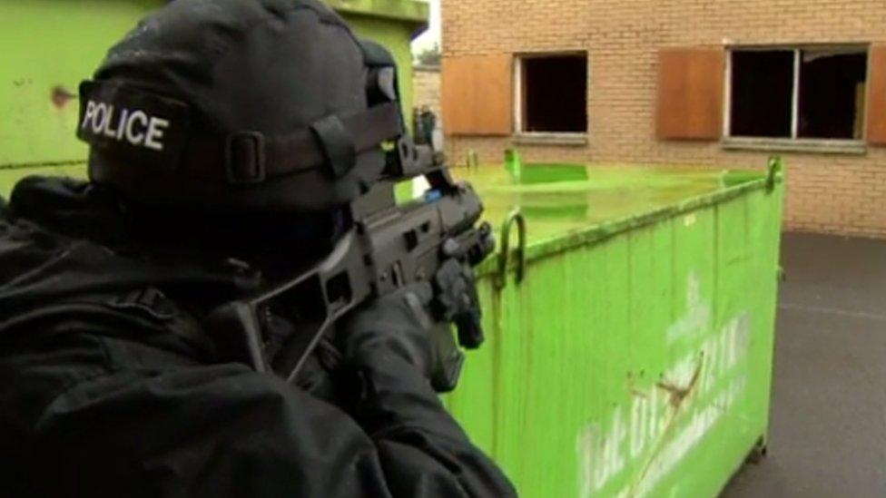 A counter-terrorist specialist firearms officer on training exercise