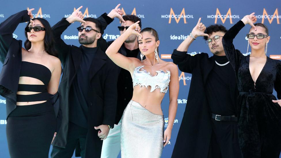 Israel's Noa Kirel and her dancers on the Eurovision turquoise carpet in Liverpool