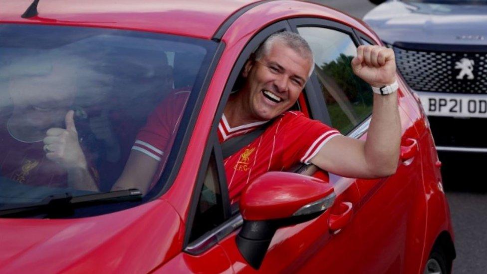 Liverpool supporters heading for the Champions League Final in Paris wait amongst freight and holiday traffic queues at the Port of Dover in Kent.