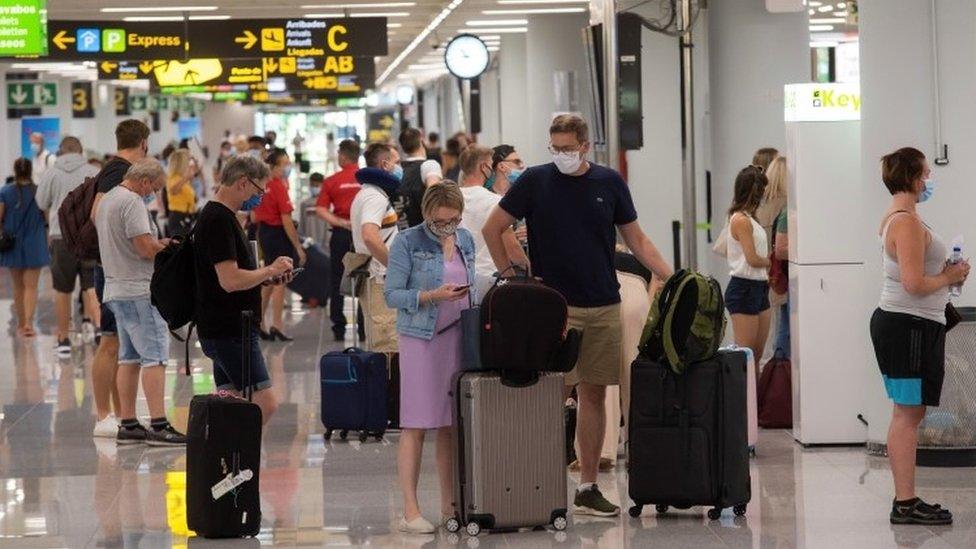 Tourists arriving at Palma airport