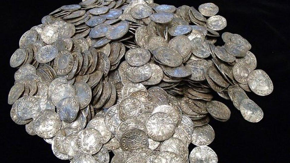 A pile of 697 coins