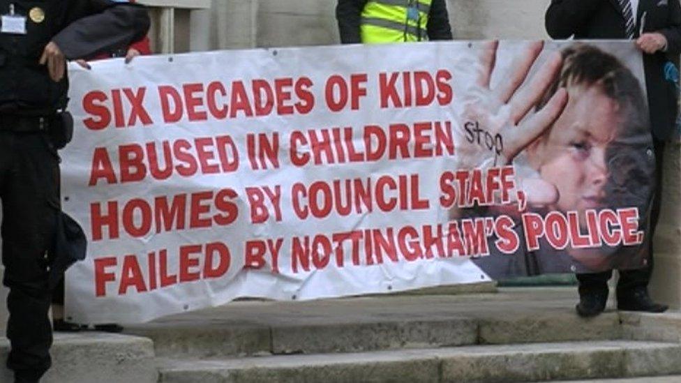 Campaigners unveiled a banner outside County Hall