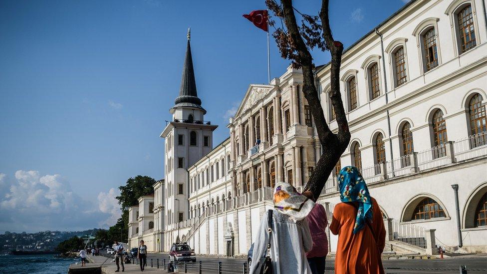 Hijab-clad women walk along the shores of the Bosphorus, Istanbul (file photo 4 August)