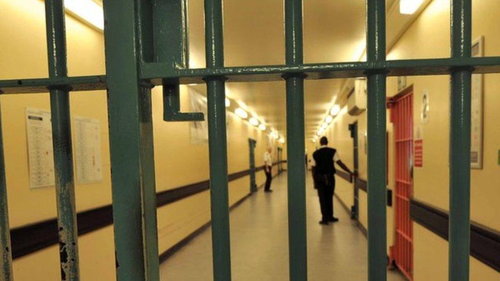 A barred door in Wormwood Scrubs prison