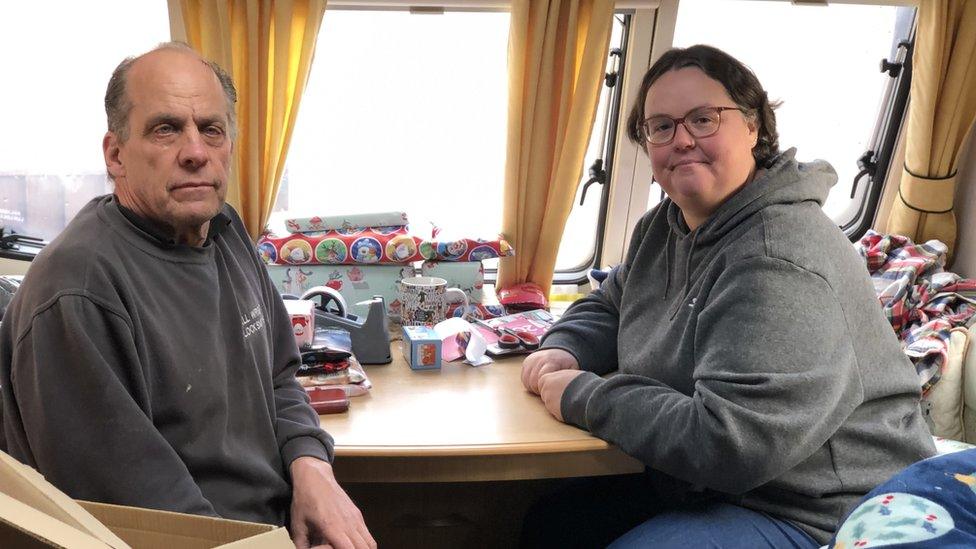 Colin Wright and Lynette Brown inside their caravan