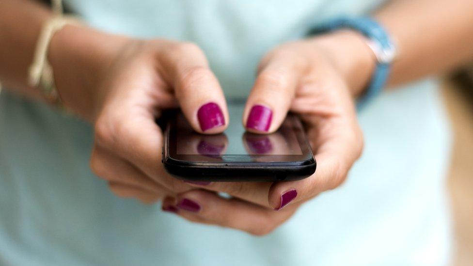 Girl holding a phone