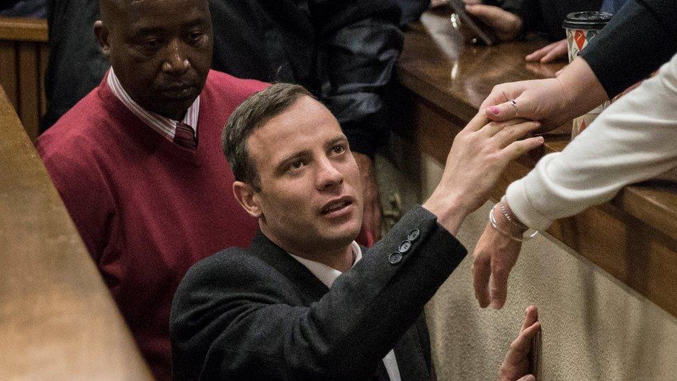 Oscar Pistorius leaves the court after his sentence hearing at the North Gauteng High Court in Pretoria, South Africa, July 6, 2016.