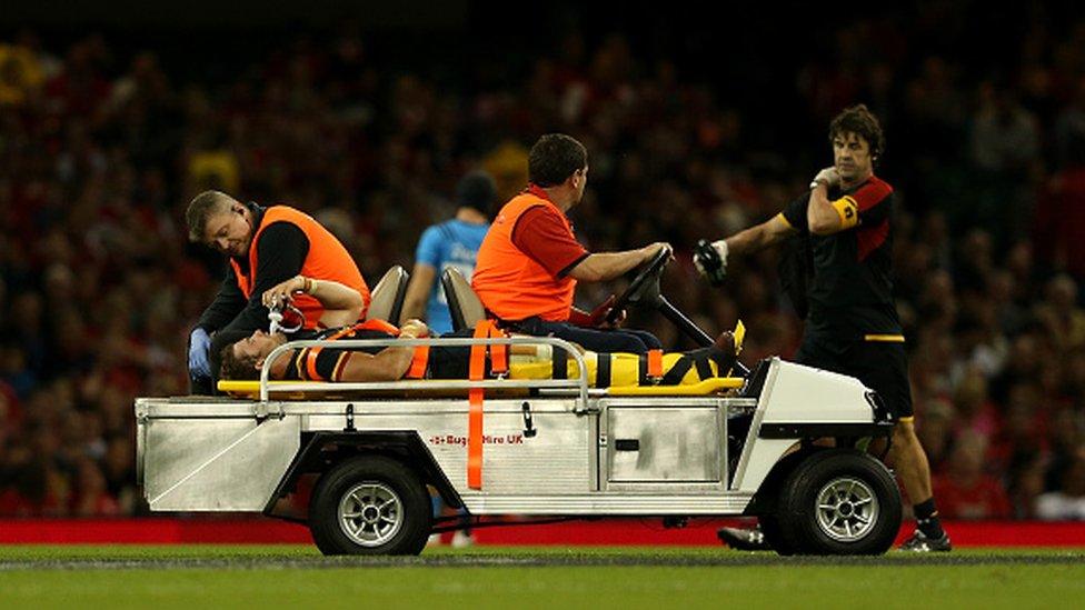 Leigh Halfpenny being taken off the field after suffering an injury