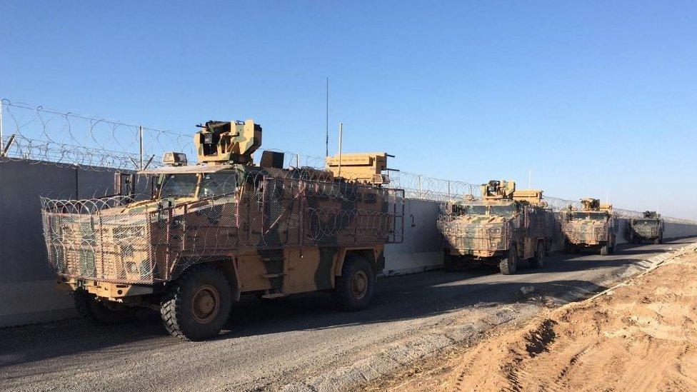 Turkish and Russian troops are seen after they completed the eighth round of joint ground patrols in northern Syria. 18 Nov 2019