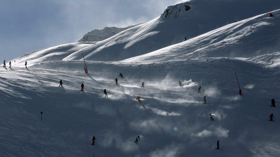 Skiers are pictured during the winter season opening in Ischgl in 2017