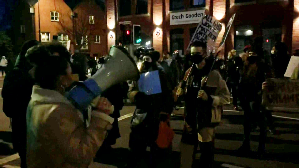 People gathered outside Cardiff Bay police station on Thursday