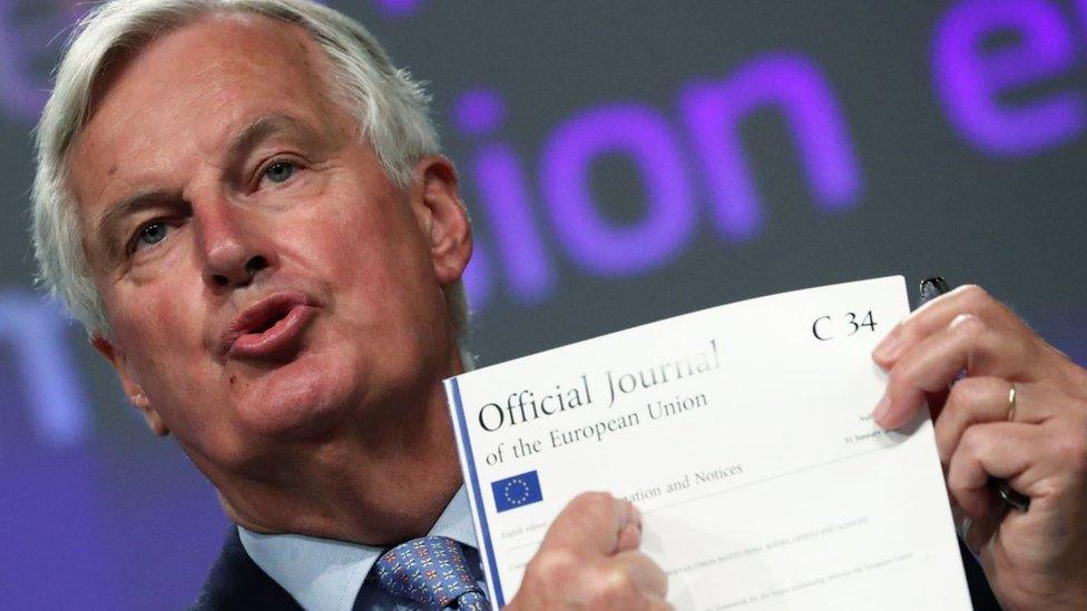 EU's Brexit negotiator Michel Barnier holding documents at a news conference after Brexit negotiations, in Brussels, Belgium, June 5, 2020