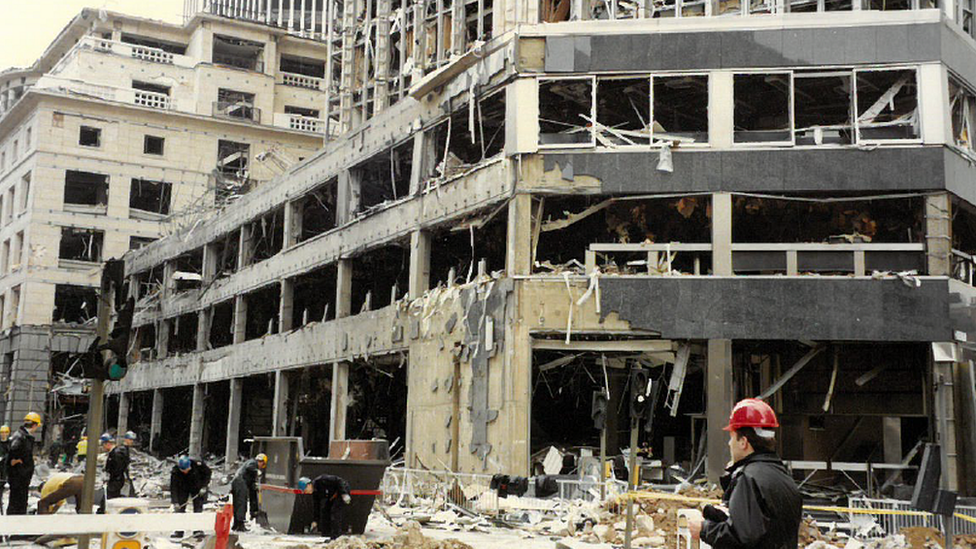 Office block with windows blown out and cladding destroyed