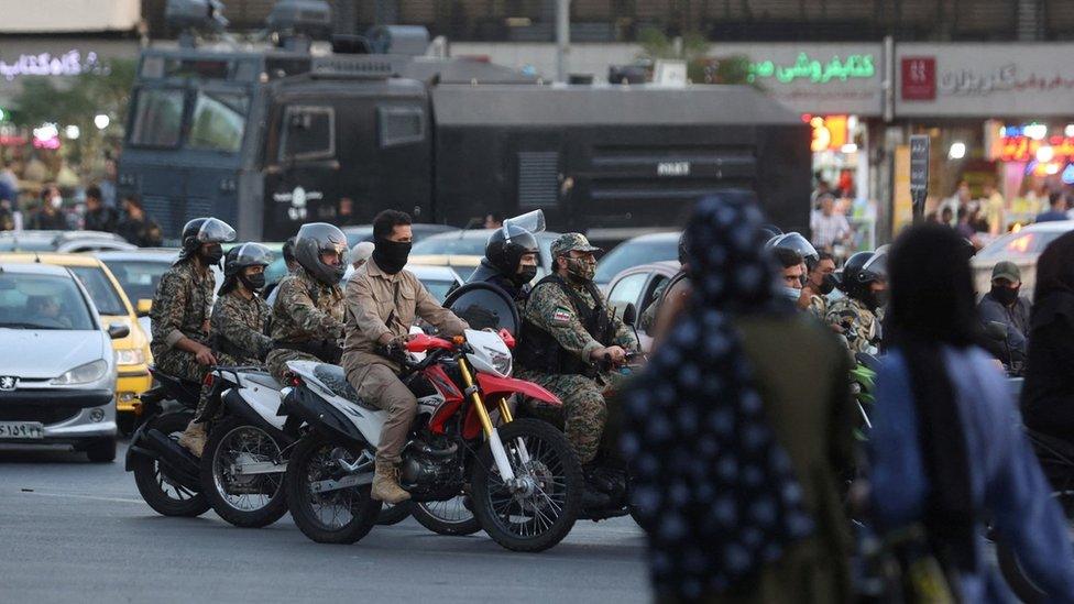 Iranian riot police ride motorbikes through Tehran, Iran (3 October 2022)