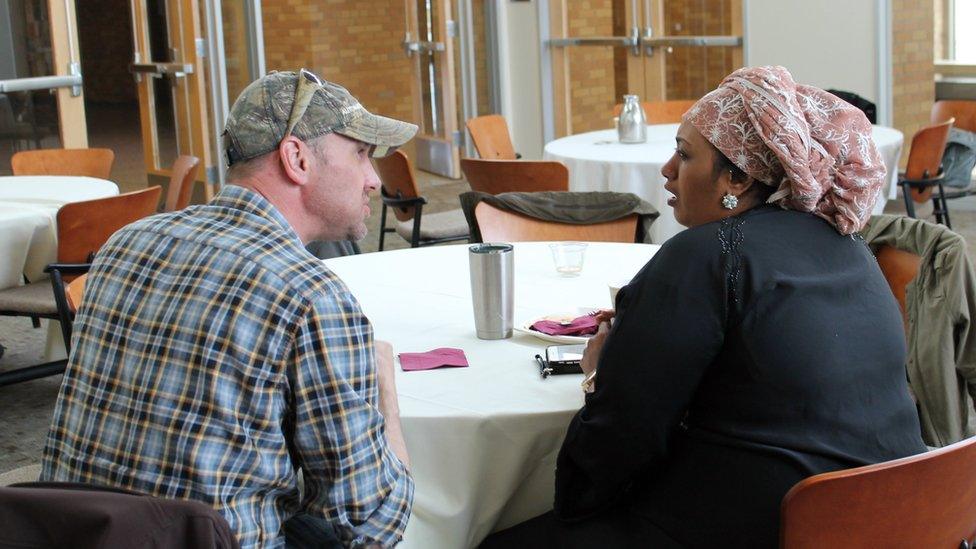 Damon Ouradnik and Fowzia Adde during a break after the story exchange