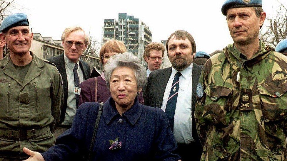 UN High Commissioner for Refugees Sadako Ogata (C) poses on the Fraternity Bridge 16 March 1994, Bosnia