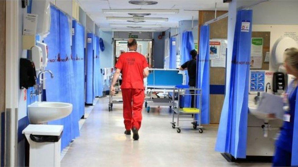 A hospital worker on a ward