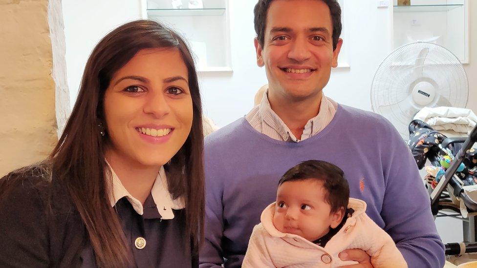 Dr Nish Patel (left) and Dr Dhruv Panchal with their baby daughter