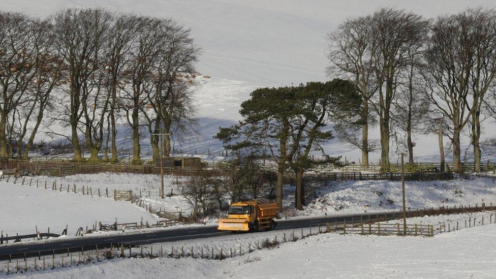 A gritter lorry on the A68 in the Scottish Borders as police are urging motorists to drive with "extreme caution" amid wintry conditions in Scotland