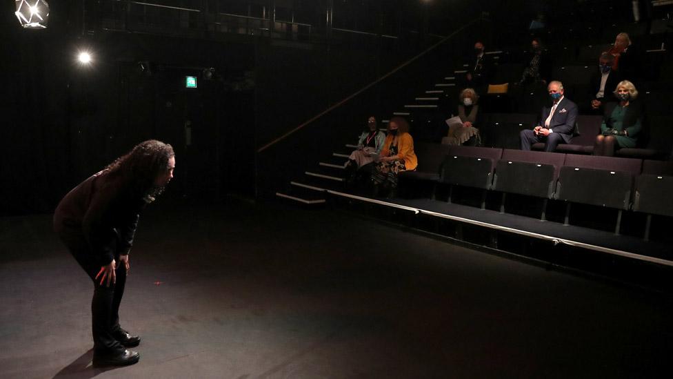 The Prince of Wales and Duchess of Cornwall watching Natasha Marshall at the Soho Theatre