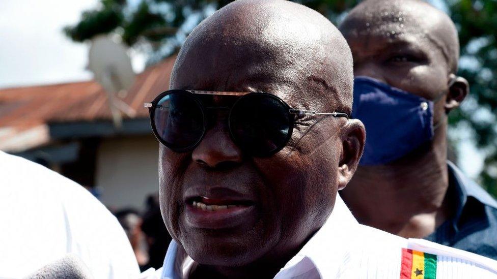 Ghanaian incumbent President Nana Akufo-Addo, and candidate of the ruling New Patriotic Party (NPP), speaks to the press after casting his vote at a polling station in the Eastern Region district of Kyebi on December 7, 2020 during Ghana's presidential and parliamentary election