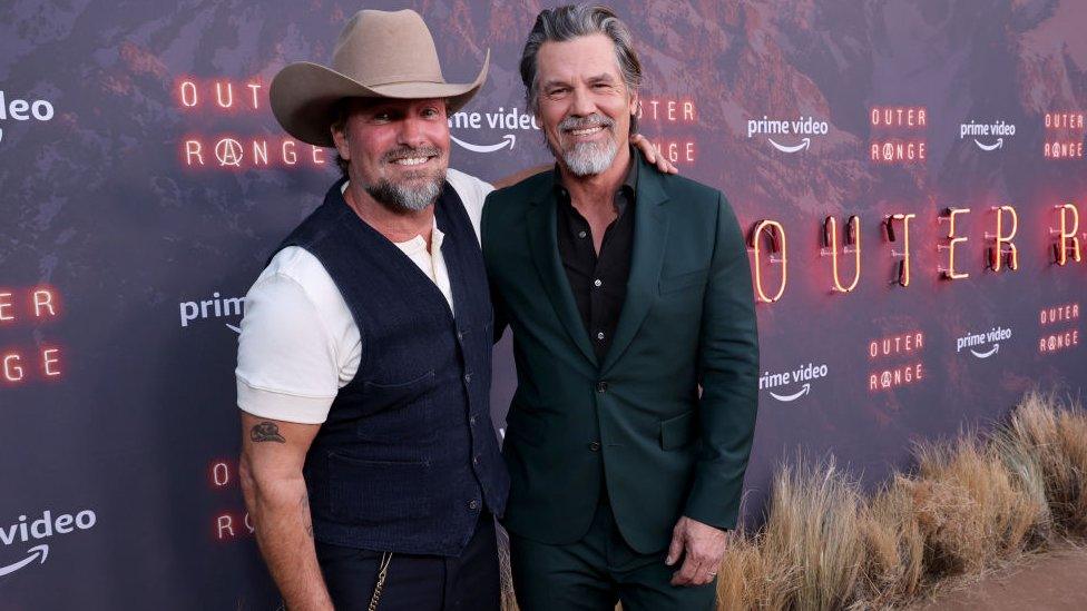 Celebrity photographer Brian Bowen Smith with actor Josh Brolin