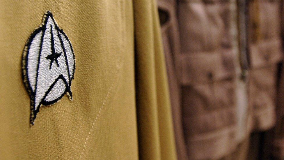 An emblem on a uniform from the Star Trek serieS