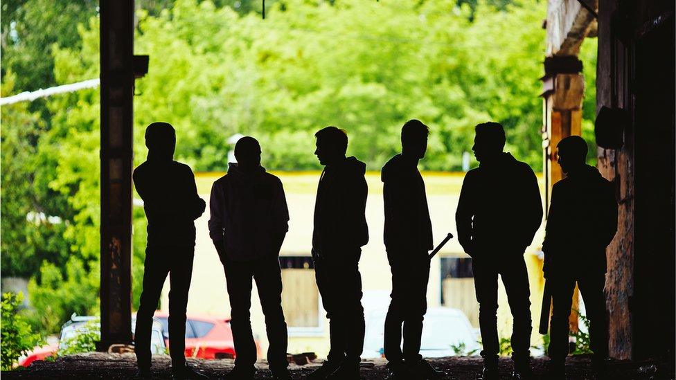 Stock image of a gang