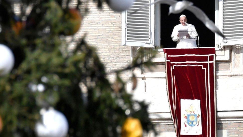 Pope Francis addresses the crowds in St Peter's Square in the Vatican on 8 December 2016