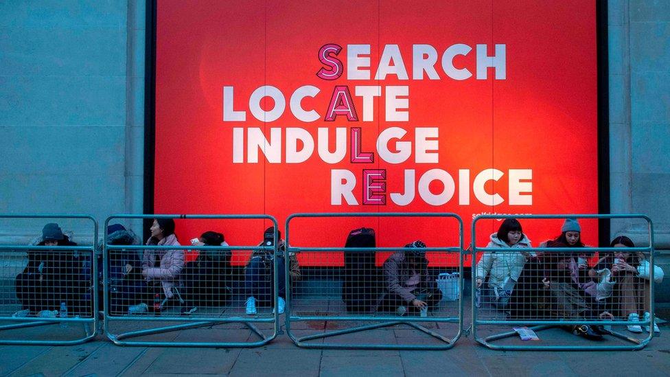 Shoppers queuing overnight outside Selfridges