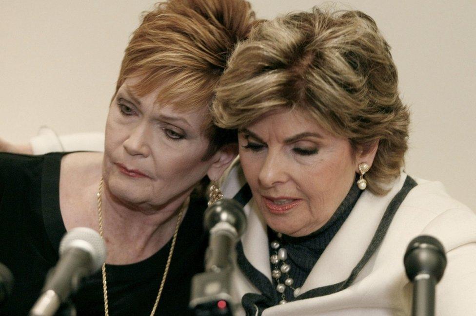 Ms Nelson (left) with her lawyer at a press conference on Friday