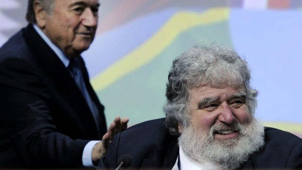 Fifa President Sepp Blatter (L) taps the shoulder of Chuck Blazer (R) in Zurich on 1 June 2011