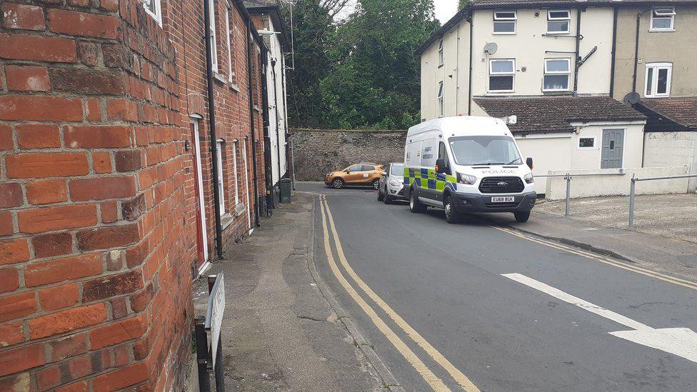 A police van in Fairfax Road, off Mersea Road