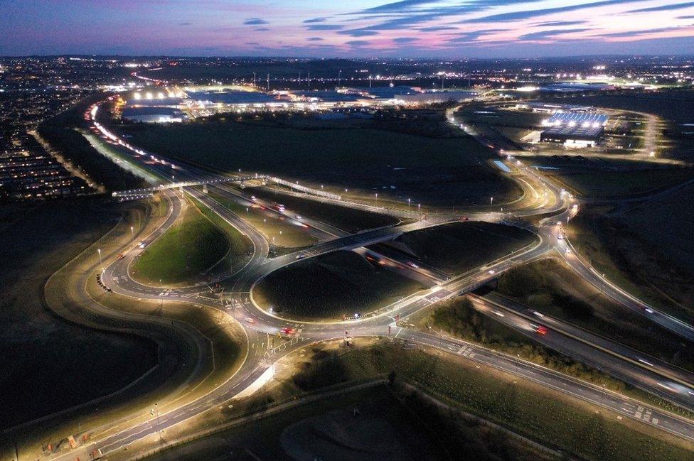 Aerial view of the new roundabout lit up by street lights as dawn breaks