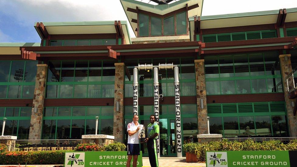 ngland's cricket team captain Kevin Pietersen (L) and his Stanford Superstars counterpart Chris Gayle pose with the trophy at the Stanford Cricket Ground in St John's on October 31, 2008