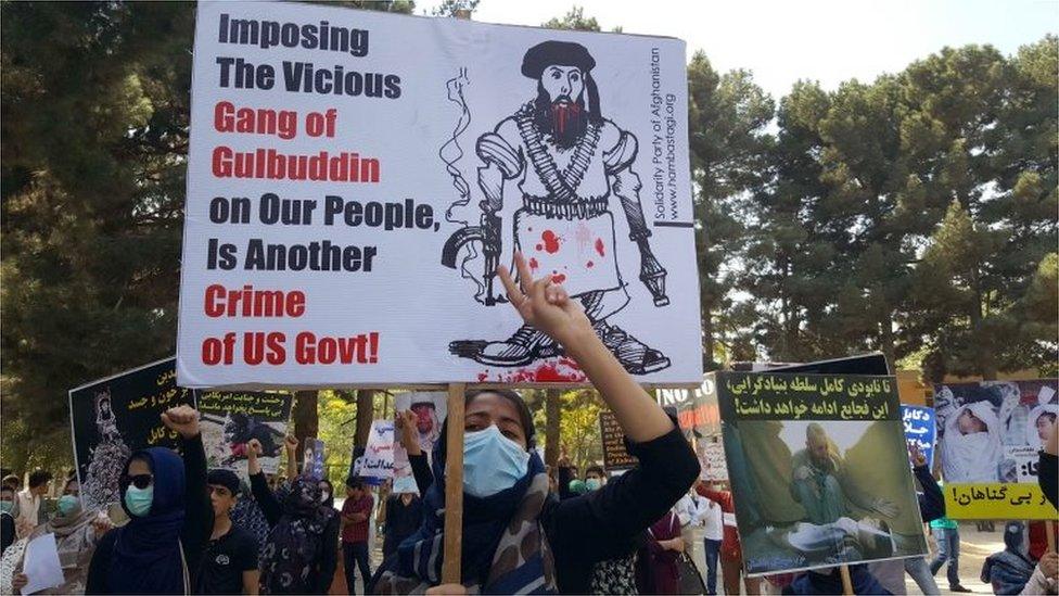 Afghans chant slogans against Gulbuddin Hekmatyar, the leader of Hezb-e-Islami, during a demonstration in Kabul on September 22, 2016.
