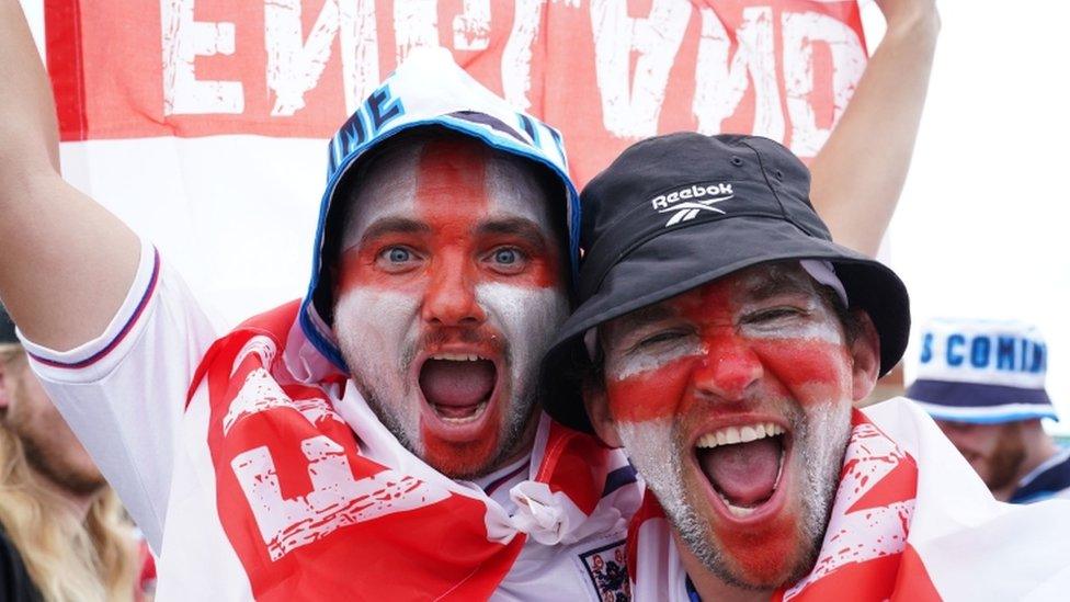 Fans in Manchester watch the Euro 2020 semi final match between England and Denmark.