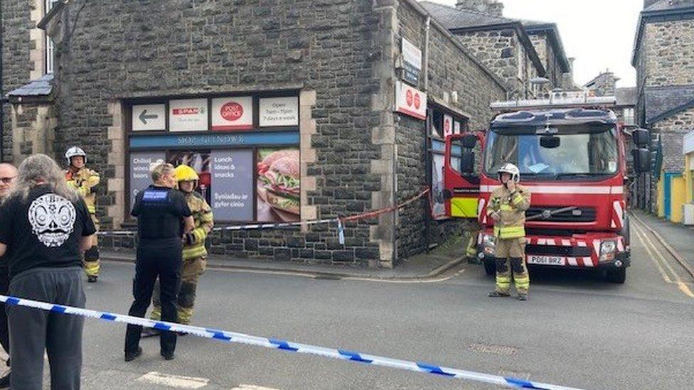 Fire service outside shop