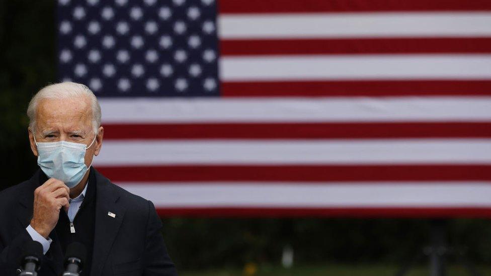 Democratic presidential nominee Joe Biden delivers remarks in the parking lot of the United Food and Commercial Workers International Union Local 951