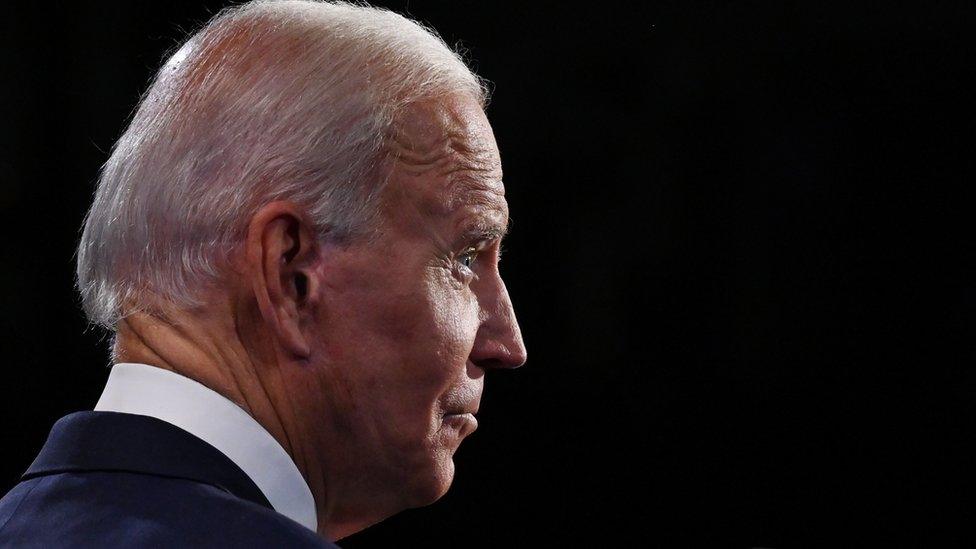 Joe Biden in profile with his right ear clearly visible