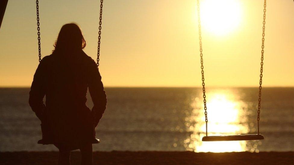 Woman on swing