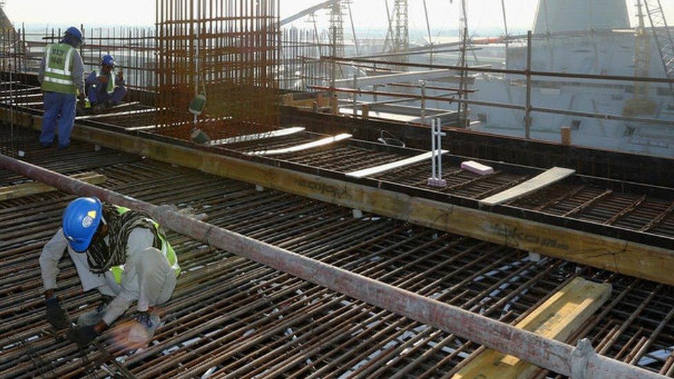 Workers at Khalifa International Stadium (file photo)