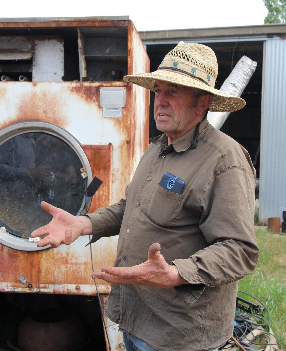 Peter Bignell with the repurposed dryer he uses in the malting his high-quality whiskies