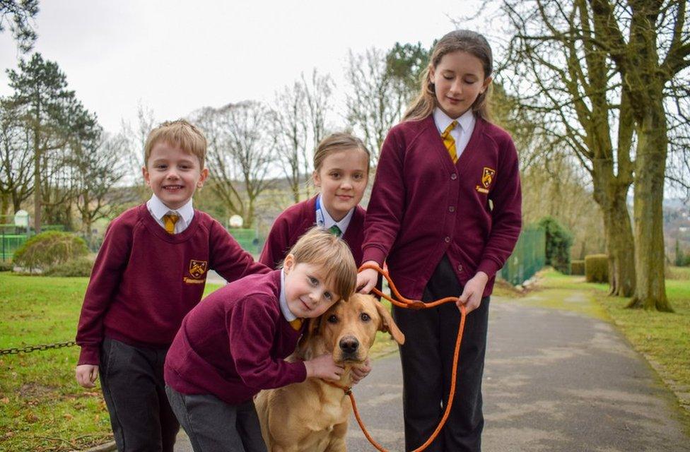 Pupils with Arthur the Labrador